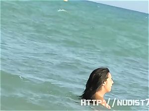 super-sexy naturist dolls are grabbed on camera on a beach